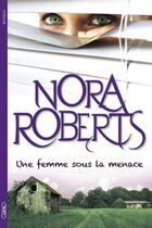 Couverture du livre « Une femme sous la menace » de Nora Roberts aux éditions Michel Lafon