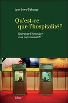 Couverture du livre « Qu'est-ce que l'hospitalité ? recevoir l'étranger à la communauté » de Joan Stavo-Debauge aux éditions Liber