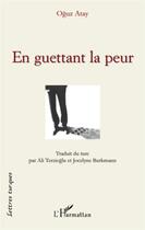 Couverture du livre « En guettant la peur et autres nouvelles » de Oguz Atay aux éditions L'harmattan