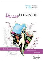 Couverture du livre « Danser à corps joie ; de la danse thérapie à l'expression sensitive » de Carine Anselme et Dominique Hautreux aux éditions Dangles