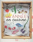 Couverture du livre « Une année en cuisine ; 100 produits à cuisiner au fil des saisons » de  aux éditions Tana