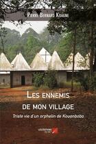 Couverture du livre « Les ennemis de mon village ; triste vie d'un orphelin de Kouonbobo » de Pierre Koagne aux éditions Editions Du Net