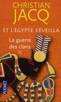 Couverture du livre « Et l'Egypte s'éveilla t.1 ; la guerre des clans » de Christian Jacq aux éditions Pocket