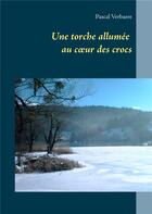 Couverture du livre « Une torche allumée au coeur des crocs » de Pascal Verbaere aux éditions Books On Demand