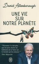Couverture du livre « Une vie sur notre planète » de David Attenborough aux éditions J'ai Lu