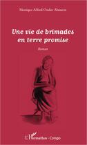 Couverture du livre « Une vie de brimades en terre promise » de Monique Alfred Ondze Abouem aux éditions Editions L'harmattan