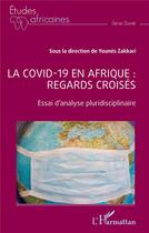 Couverture du livre « La Covid -19 en Afrique : regards croisés : essai d'analyse pluridisciplinaire » de Zakkari Younes aux éditions L'harmattan