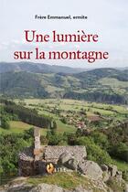 Couverture du livre « Une lumière sur la montagne » de Frere Emmanuel aux éditions Life