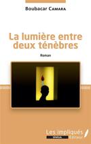 Couverture du livre « La lumière entre deux ténèbres » de Boubacar Camara aux éditions Les Impliques