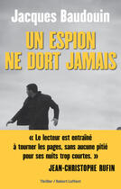 Couverture du livre « Un espion ne dort jamais » de Jacques Baudouin aux éditions Robert Laffont