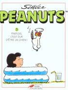 Couverture du livre « Peanuts t.3 ; parfois c'est dur d'etre un chien » de Charles Monroe Schulz aux éditions Hors Collection