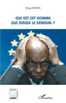 Couverture du livre « Qui est cet homme qui dirige le Sénégal ? » de Mody Niang aux éditions Editions L'harmattan