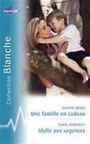 Couverture du livre « Une famille en cadeau ; idylle aux urgences » de Drake Dianne et Carol Marinelli aux éditions Harlequin