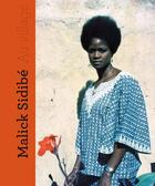 Couverture du livre « Au village » de Brigitte Ollier et Malick Sidibe aux éditions Editions De L'oeil