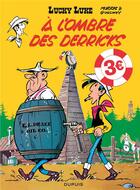 Couverture du livre « Lucky Luke Tome 18 : à l'ombre des derricks » de Rene Goscinny et Morris aux éditions Dupuis