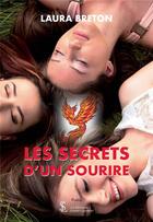 Couverture du livre « Les secrets d un sourire » de Breton Laura aux éditions Sydney Laurent