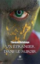 Couverture du livre « Un étranger dans le miroir » de Thomas Delahaye aux éditions Le Lys Bleu