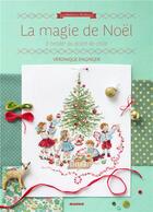 Couverture du livre « La magie de Noël ; à broder au point de croix » de Veronique Enginger aux éditions Mango