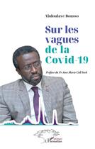Couverture du livre « Sur les vagues de la Covid-19 » de Abdoulaye Bousso aux éditions L'harmattan