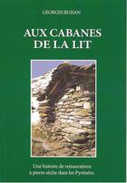 Couverture du livre « Aux cabanes de la lit ; une histoire de restaurations à pierre sèche dans les Pyrénées » de Georges Buisan aux éditions Cairn