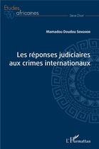Couverture du livre « Les réponses judiciaires aux crimes internationaux » de Mamadou Doudou Senghor aux éditions L'harmattan