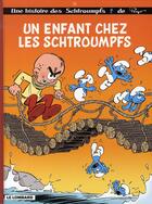 Couverture du livre « Les Schtroumpfs Tome 25 : un enfant chez les Schtroumpfs » de Peyo aux éditions Lombard