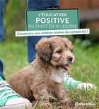 Couverture du livre « L'éducation positive du chiot en 10 leçons » de Chloe Fesch aux éditions Rustica
