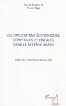 Couverture du livre « Les implications économiques, comptables et fiscales dans le système Ohada » de Victor Tsapi aux éditions L'harmattan