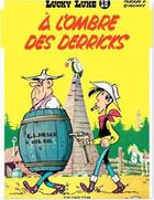 Couverture du livre « Lucky Luke Tome 18 : à l'ombre des derricks » de Rene Goscinny et Morris aux éditions Dupuis