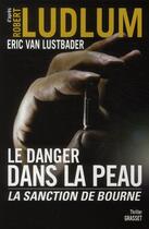 Couverture du livre « Le danger dans la peau ; la sanction de Bourne » de Eric Van Lustbader aux éditions Grasset