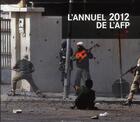 Couverture du livre « L'annuel de l'AFP 2012 ; le monde en images » de Agence France-Presse aux éditions Democratic Books