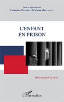 Couverture du livre « L'enfant en prison » de Catherine Menabe et Mathieu Martinelle aux éditions L'harmattan
