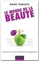 Couverture du livre « Le monde de la beauté ; comment les marques transforment notre apparence » de Mark Tungate aux éditions Dunod