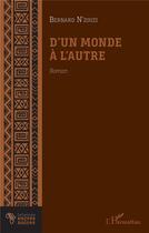 Couverture du livre « D'un monde a l'autre » de Bernard N'Zouzi aux éditions L'harmattan