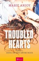 Couverture du livre « Troubled hearts Tome 1 : juste un défi entre nous » de Marie Anjoy aux éditions So Romance