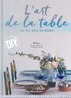 Couverture du livre « L'art de la table au fil des saisons » de Mathilde Raoult et Margaux Basseville aux éditions De Saxe