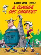 Couverture du livre « Lucky Luke Tome 18 : à l'ombre des derricks » de Rene Goscinny et Morris aux éditions Dupuis