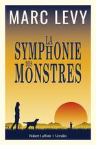 Couverture du livre « La symphonie des monstres » de Marc Levy aux éditions Robert Laffont / Versilio