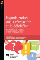 Couverture du livre « Regards croisés sur la rétroaction et le débriefing ; accompagner, former et professionnaliser » de Michèle Saint-Jean et Nathalie Lafranchise et Chantale Lepage et Louise Lafortune aux éditions Presses De L'universite Du Quebec