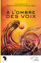 Couverture du livre « A l'ombre des voix » de Alpha Amadou Sy et Ibrahima Wane aux éditions L'harmattan
