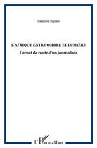 Couverture du livre « L'afrique entre ombre et lumiere - carnet de route d'un journaliste » de Ibrahima Signate aux éditions L'harmattan