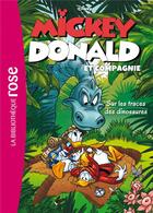 Couverture du livre « Mickey, Donald et compagnie t.3 ; sur les traces des dinosaures » de  aux éditions Hachette Jeunesse