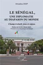 Couverture du livre « Le Sénégal, une diplomatie au diapason du monde : Champ évolutif, jeux et enjeux » de Amadou Diop aux éditions L'harmattan