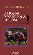 Couverture du livre « Un rasoir dans les mains d'un singe » de Guy Marchand aux éditions Michel Lafon