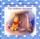 Couverture du livre « Une journée avec Winnie l'Ourson ; un visiteur inconnu » de Disney aux éditions Disney Hachette