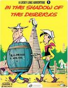 Couverture du livre « Lucky Luke t.5 : in the shadow of the derricks » de Rene Goscinny et Morris aux éditions Cinebook