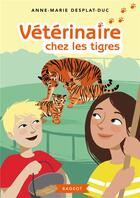 Couverture du livre « Vétérinaire chez les tigres » de Anne-Marie Desplat-Duc aux éditions Rageot