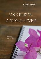 Couverture du livre « Une fleur a ton chevet » de Obiang Karl aux éditions Sydney Laurent