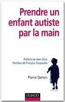 Couverture du livre « Prendre un enfant autiste par la main » de Pierre Delion aux éditions Dunod