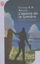 Couverture du livre « L'agonie de la lumiere » de George R. R. Martin aux éditions J'ai Lu